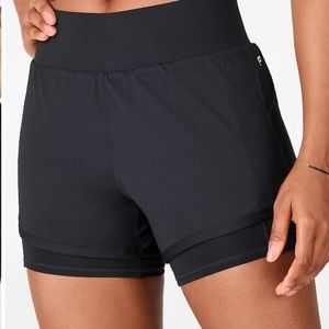 Fabletics running shorts with pockets
